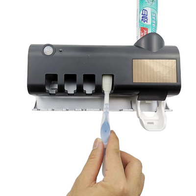Supporto UV dello spazzolino da denti del supporto senza fili della parete di sterilizzazione con il supporto di tazza della spazzola